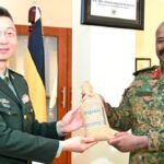 CDF Gen Muhoozi with a Chinese official