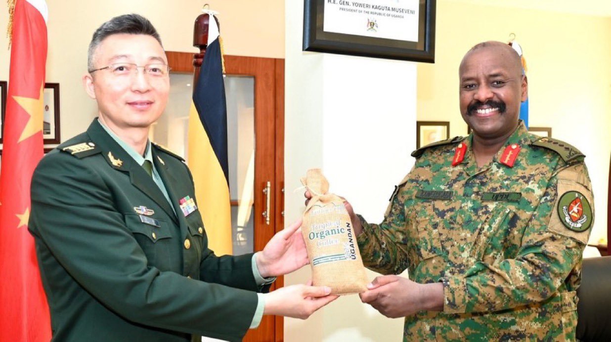 CDF Gen Muhoozi with a Chinese official