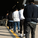 Deported-Migrants-872x547