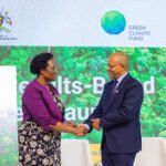 Mr. Ezana Kassa FAO Uganda Country Representative with Hon Beatrice Atin Anwar the Ste Minister of Environment at the launch of Aficas First REDD+Results -Based Payment Project at Speke Resort Munyonyo .