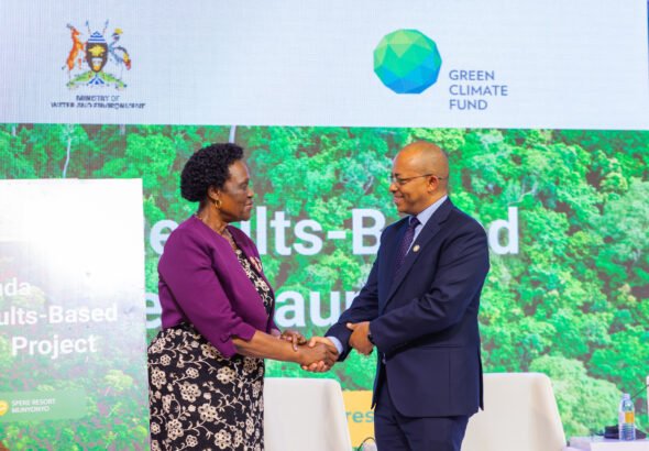Mr. Ezana Kassa FAO Uganda Country Representative with Hon Beatrice Atin Anwar the Ste Minister of Environment at the launch of Aficas First REDD+Results -Based Payment Project at Speke Resort Munyonyo .