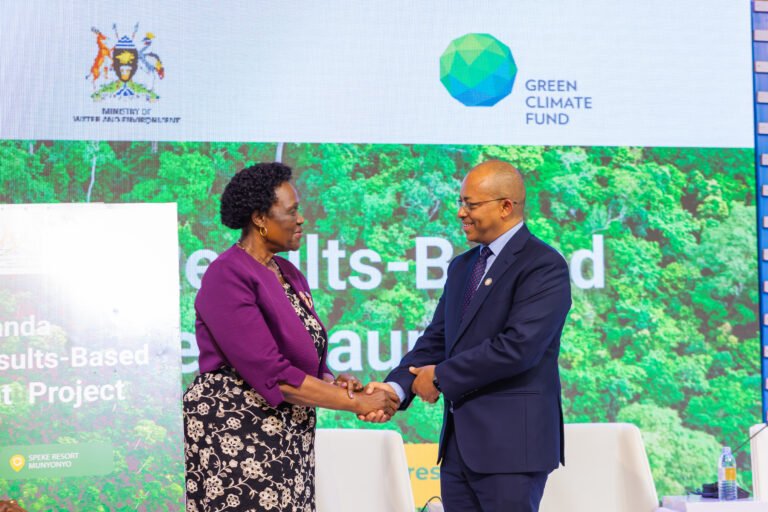 Mr. Ezana Kassa FAO Uganda Country Representative with Hon Beatrice Atin Anwar the Ste Minister of Environment at the launch of Aficas First REDD+Results -Based Payment Project at Speke Resort Munyonyo .